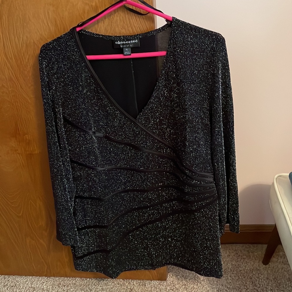 Beautiful tunic with faux ruching detail. Classic look without overpowering